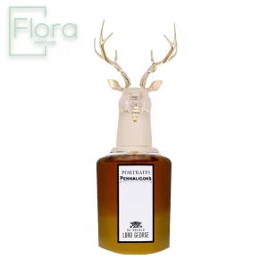 تصویری از شیشه عطر پنهالیگونز د تراژدی آف لرد جورج را نشان میدهد که با طراحی منحصر به فرد خود توجه را جلب میکند. شیشه با رنگ قهوهای شفاف و برچسب سفید و مشکی که نام عطر “THE TRAGEDY OF LORD GEORGE” روی آن نوشته شده است، به چشم میخورد. درب عطر به شکل یک سر گوزن طلایی طراحی شده که بر زیبایی و لوکس بودن شیشه افزوده است. لوگوی “Flora Perfume” نیز در گوشه بالا سمت چپ تصویر قرار دارد.