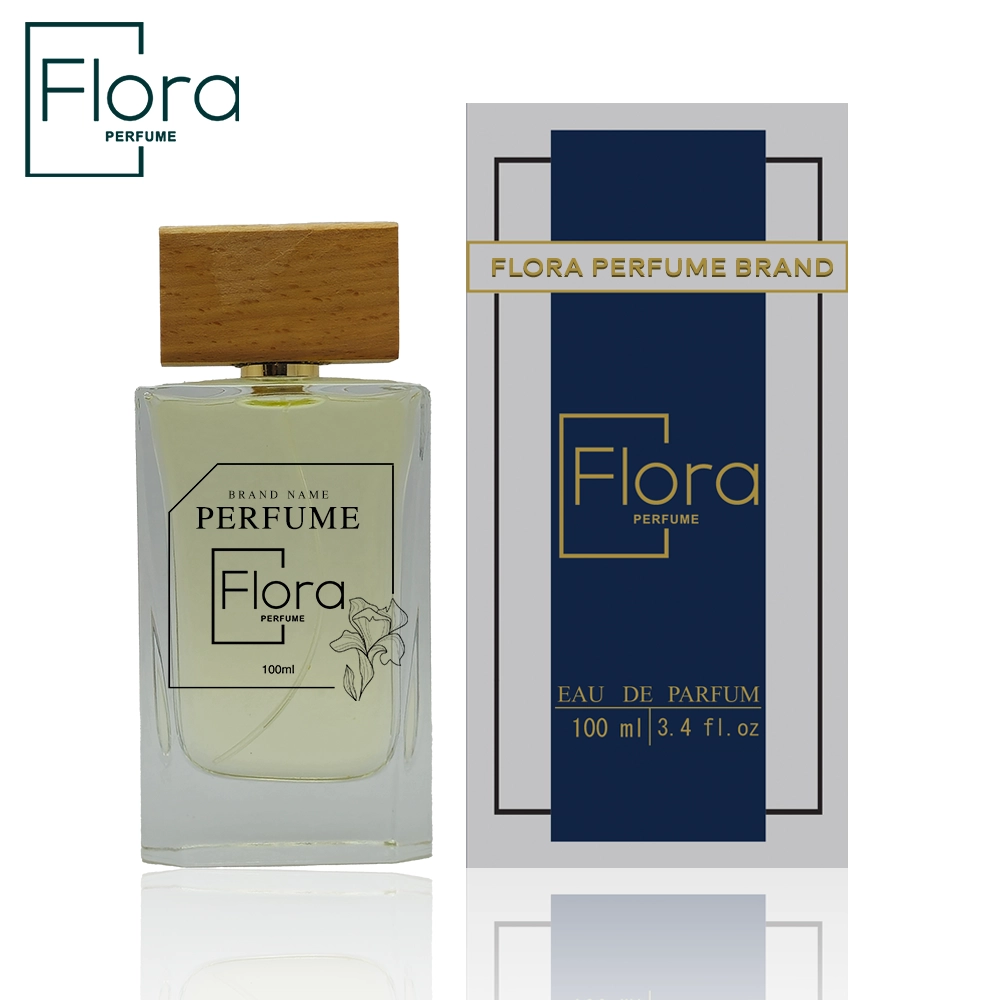 تصویری از یکی از عطرهای مردانه برند فلورا با طراحی شیشه شفاف، درب چوبی و نشان حک شده برند “Flora Perfume”. این عطر با حجم 100 میلی‌لیتر و بسته‌بندی شیک به رنگ سورمه‌ای و طلایی ارائه شده است که ظاهری لوکس و جذاب دارد. شیشه این عطر با ظرافت خاص طراحی شده و گل روی آن، حس طراوت و زیبایی را تداعی می‌کند. بسته‌بندی مدرن و مینیمال با شعار “Flora Perfume Brand” در قسمت بالای جعبه، کیفیت بالای این محصول را نشان می‌دهد. عطری مناسب برای آقایانی که به دنبال رایحه‌ای ماندگار و خاص هستند.